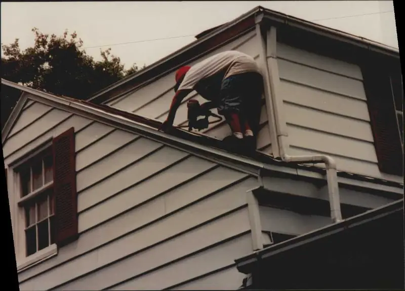 Derik Kilker as a teenager roofing a house in Illinois, 1995