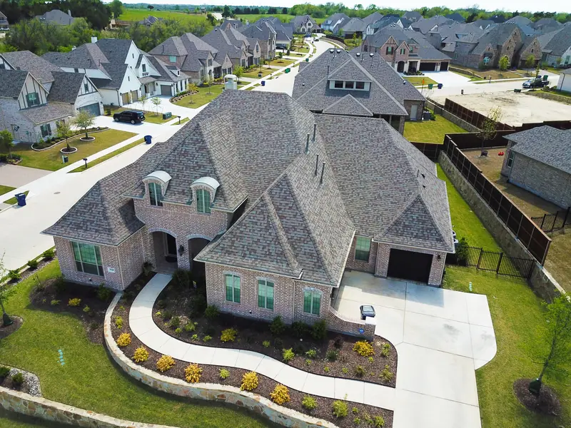 Finished roof replacement on a large Prosper home